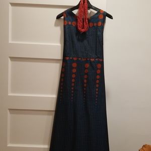 South African sleeveless silhouette dress